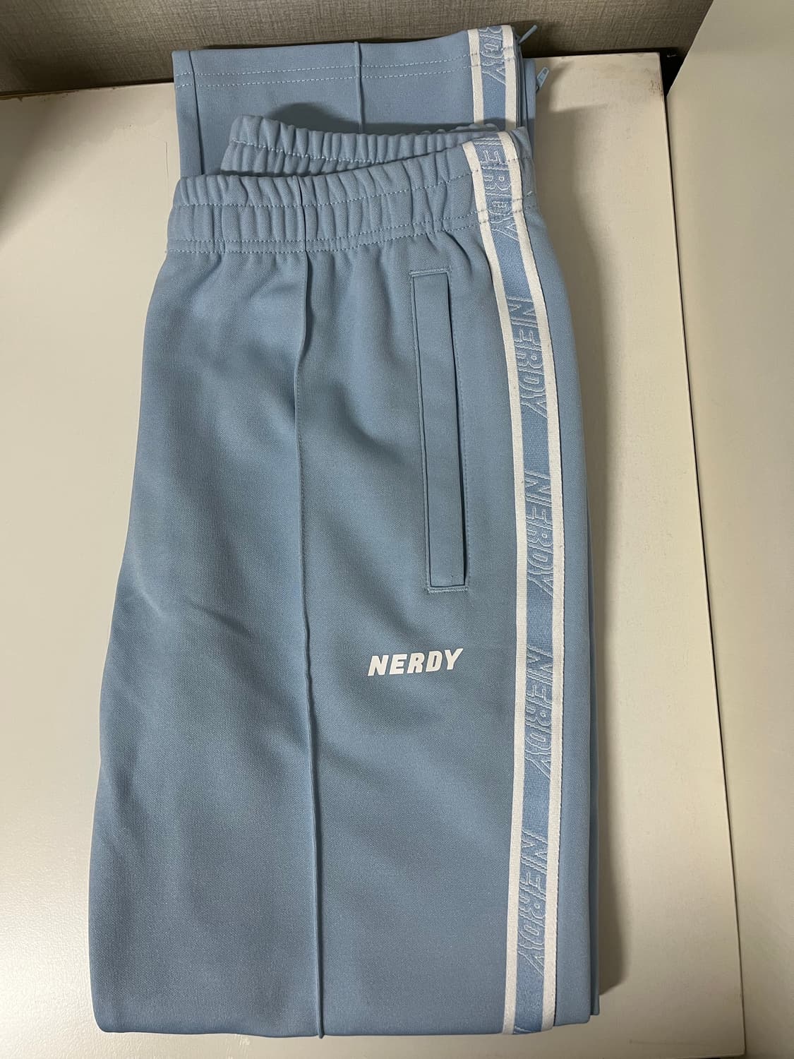 널디 로고 테잎 트랙 팬츠 스카이블루 M 상품이미지1