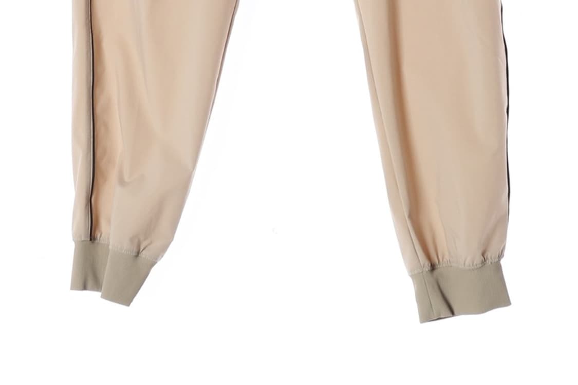 엄브로 베이지 사이드라인 우븐 조거팬츠 상품이미지5