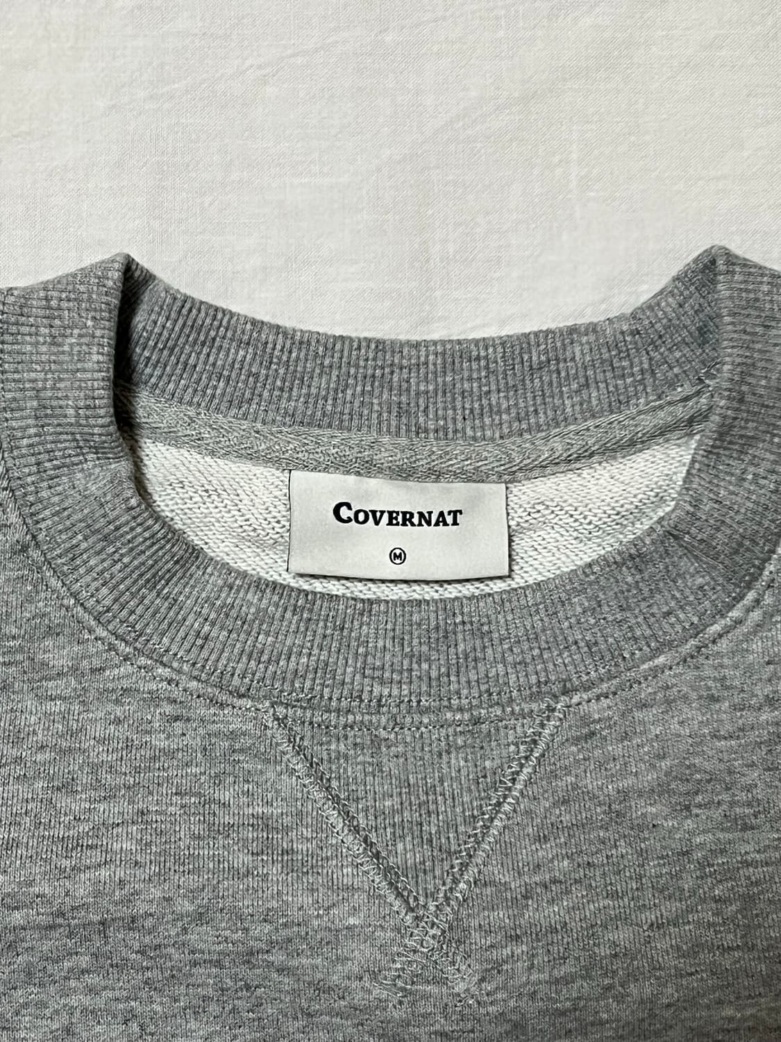 [새상품] M) 커버낫 시그니처 심볼 맨투맨 멜란지 그레이 상품이미지5