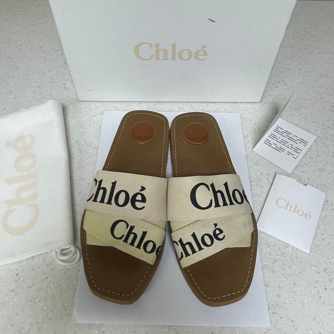 끌로에 우디 뮬 화이트 상품이미지1