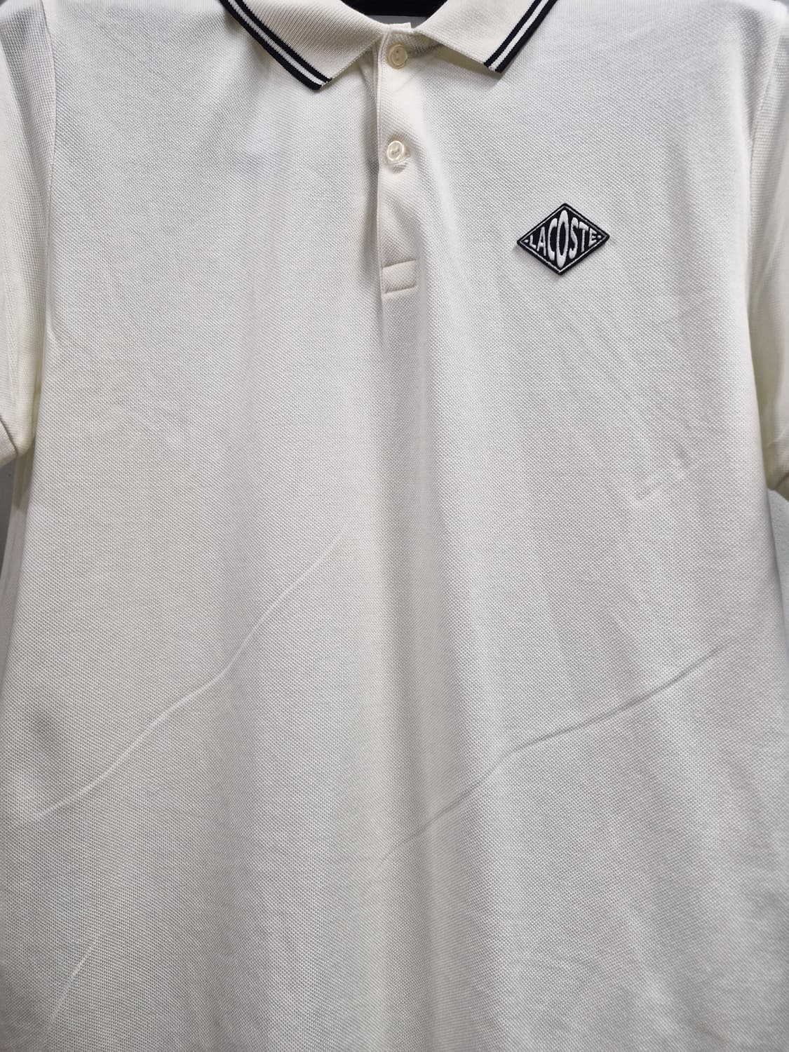 105XL 라코스테 카라 반팔티 아이보리. 상품이미지4