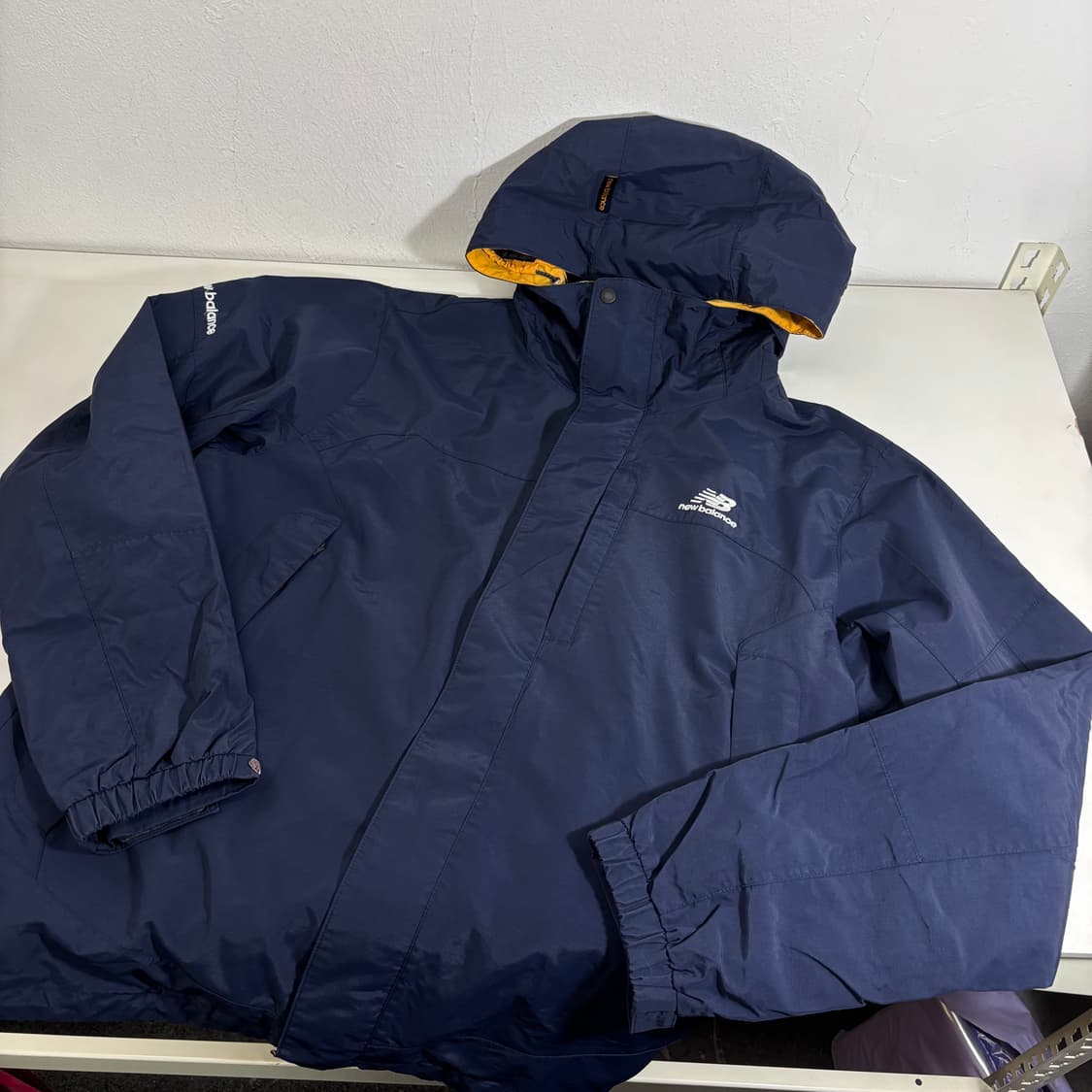 100 L 뉴발란스 네이비 기본로고 후드 나일론 바막자켓 상품이미지1
