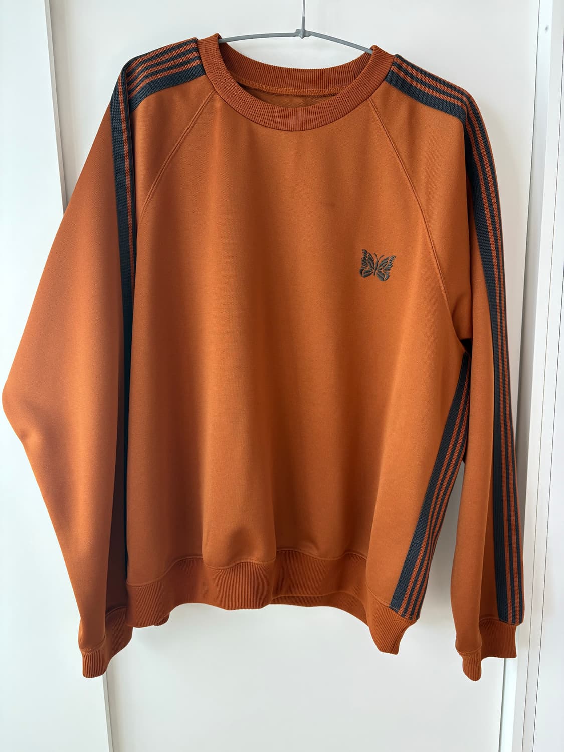 니들스 상의 상품이미지1