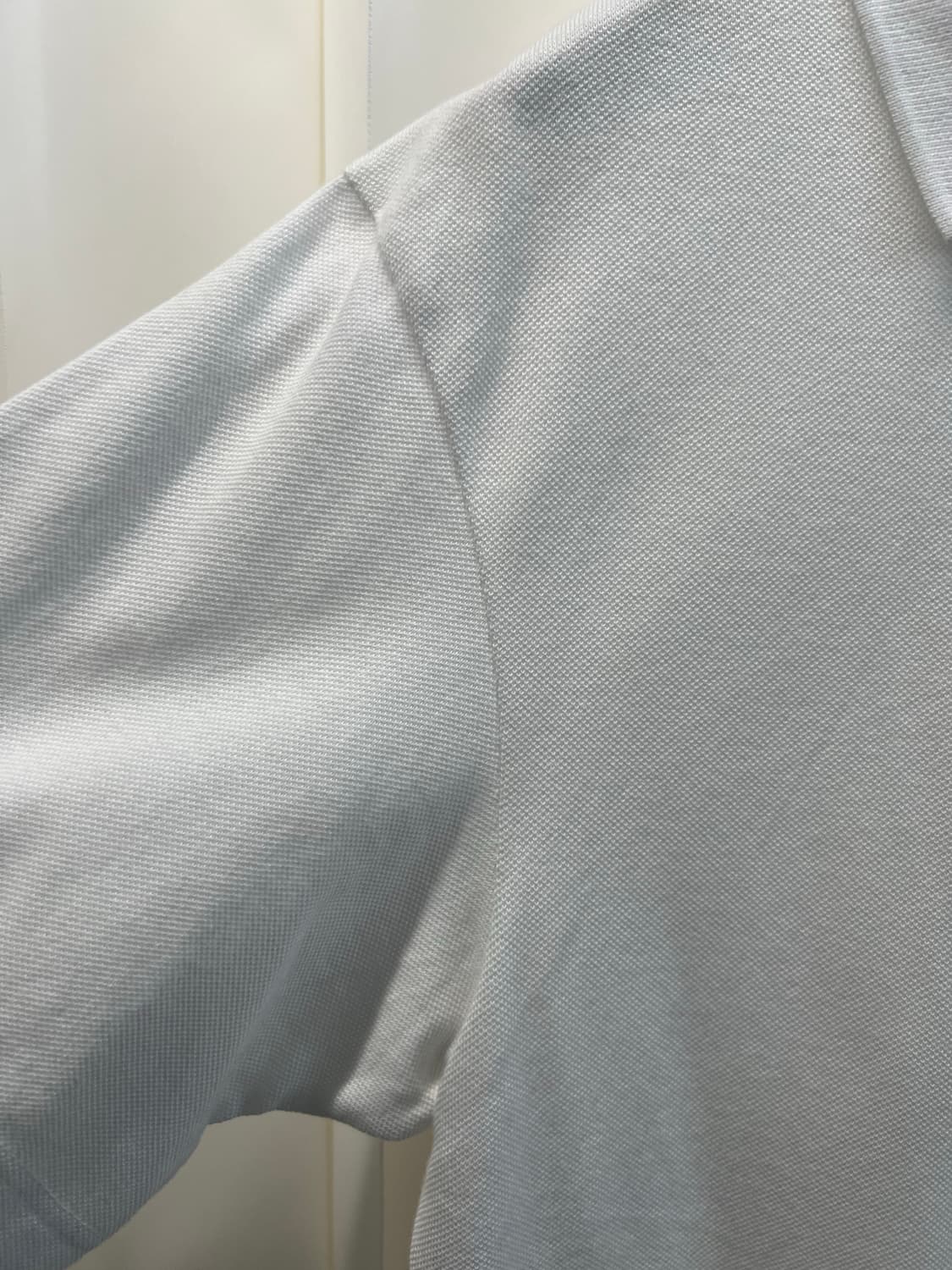 라코스테X꼼데가르숑 화이트 폴로티 상품이미지4