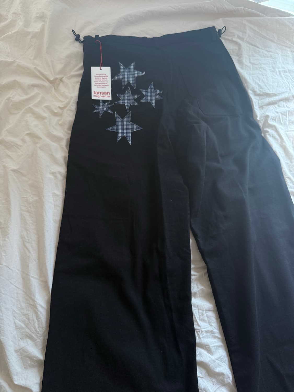 탄산마그네슘 스타 아플리케 블랙 팬츠 상품이미지1