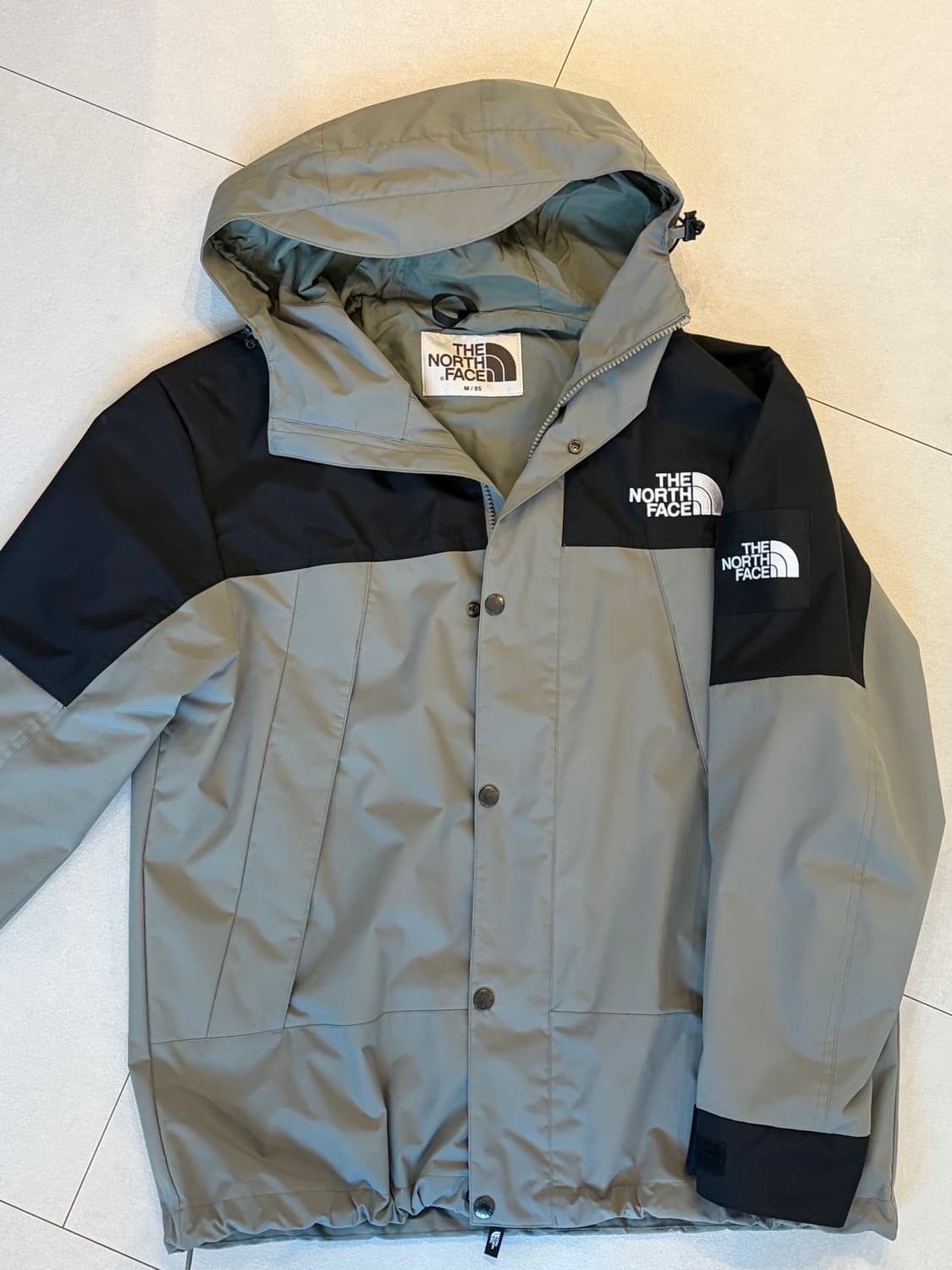 노스페이스 카키 바람막이 95(m) 상품이미지1