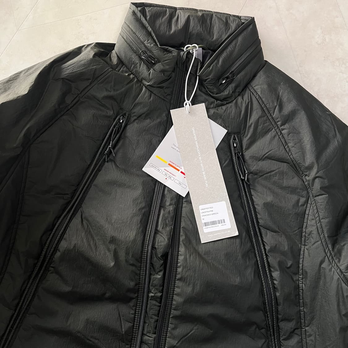 새상품)언어펙티드 패디드 오블리크 집 점퍼 크랙그린 상품이미지1