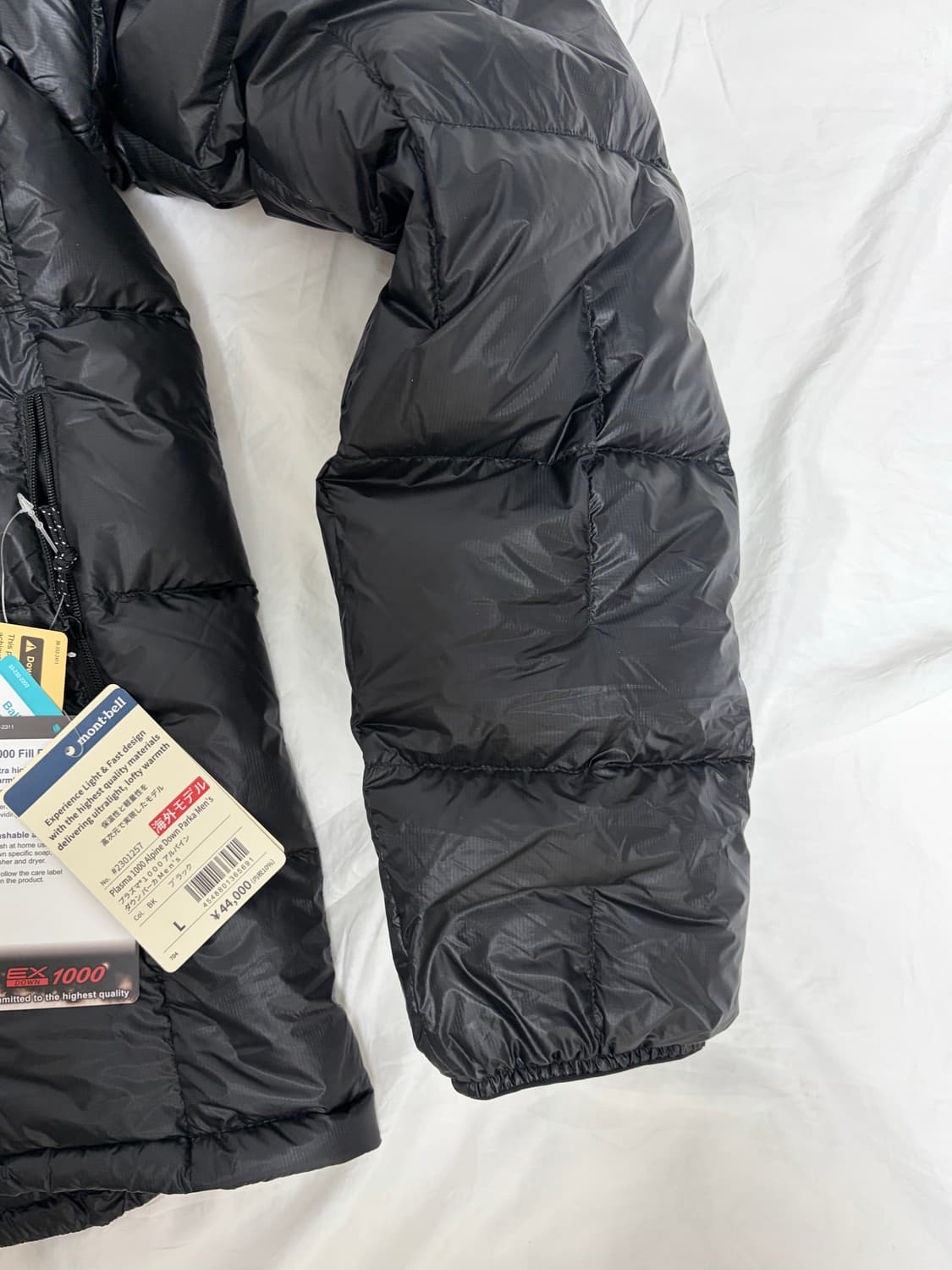몽벨 플라즈마 1000 알파인 다운 블랙 L 새상품 판매합니다 상품이미지4
