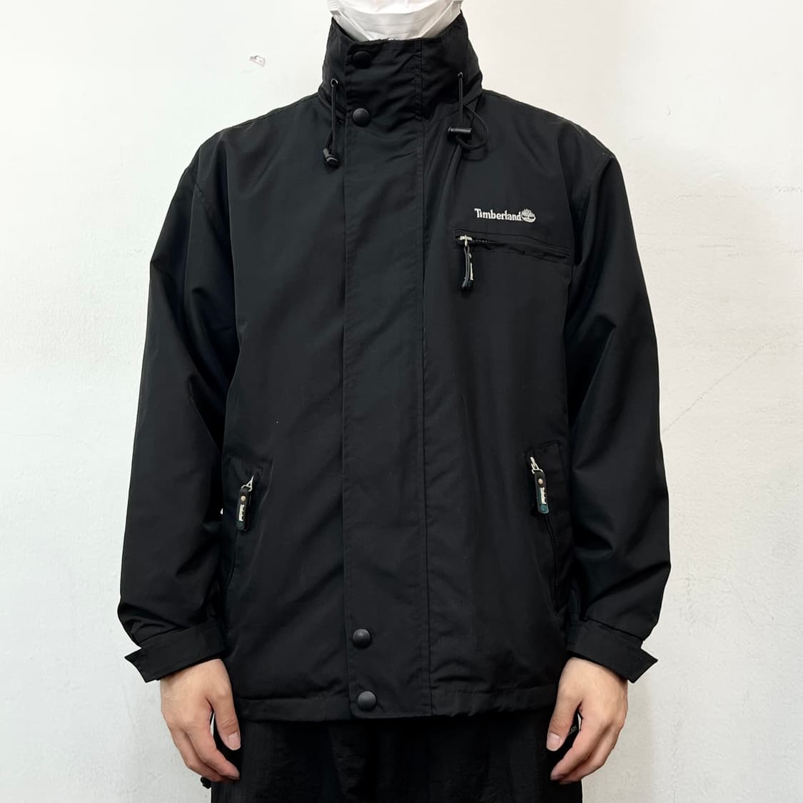 팀버랜드 로고 비대칭 지퍼 하이넥 바람막이 자켓 상품이미지1