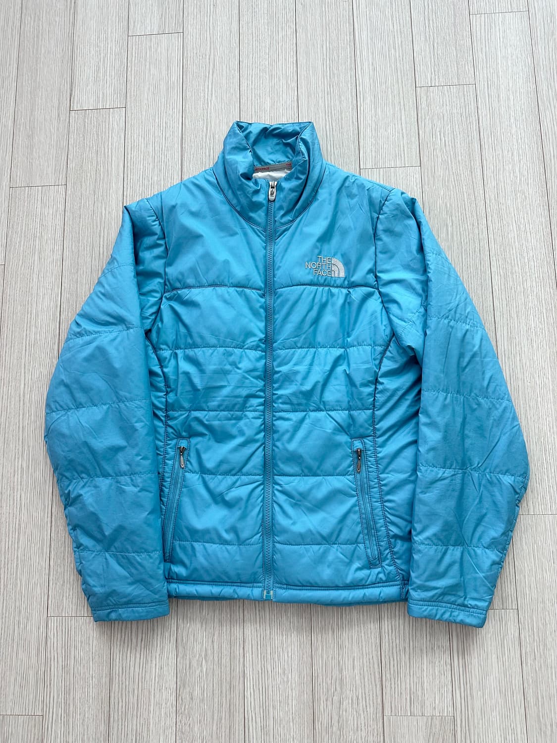 노스페이스 스카이블루 경량패딩 아우터 점퍼 상품이미지1