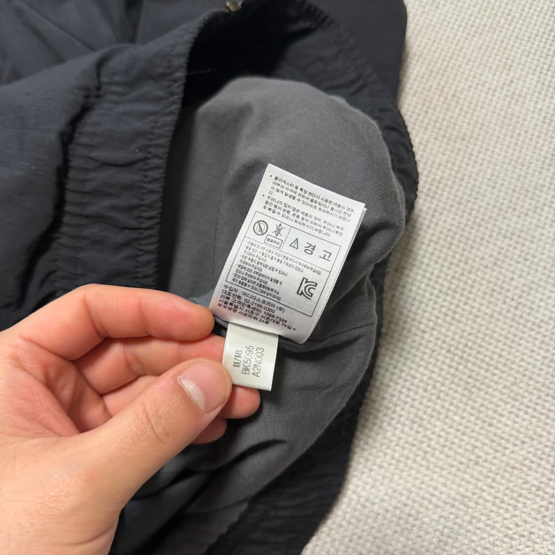 리복 빅로고 패턴 바람막이 자켓 상품이미지4