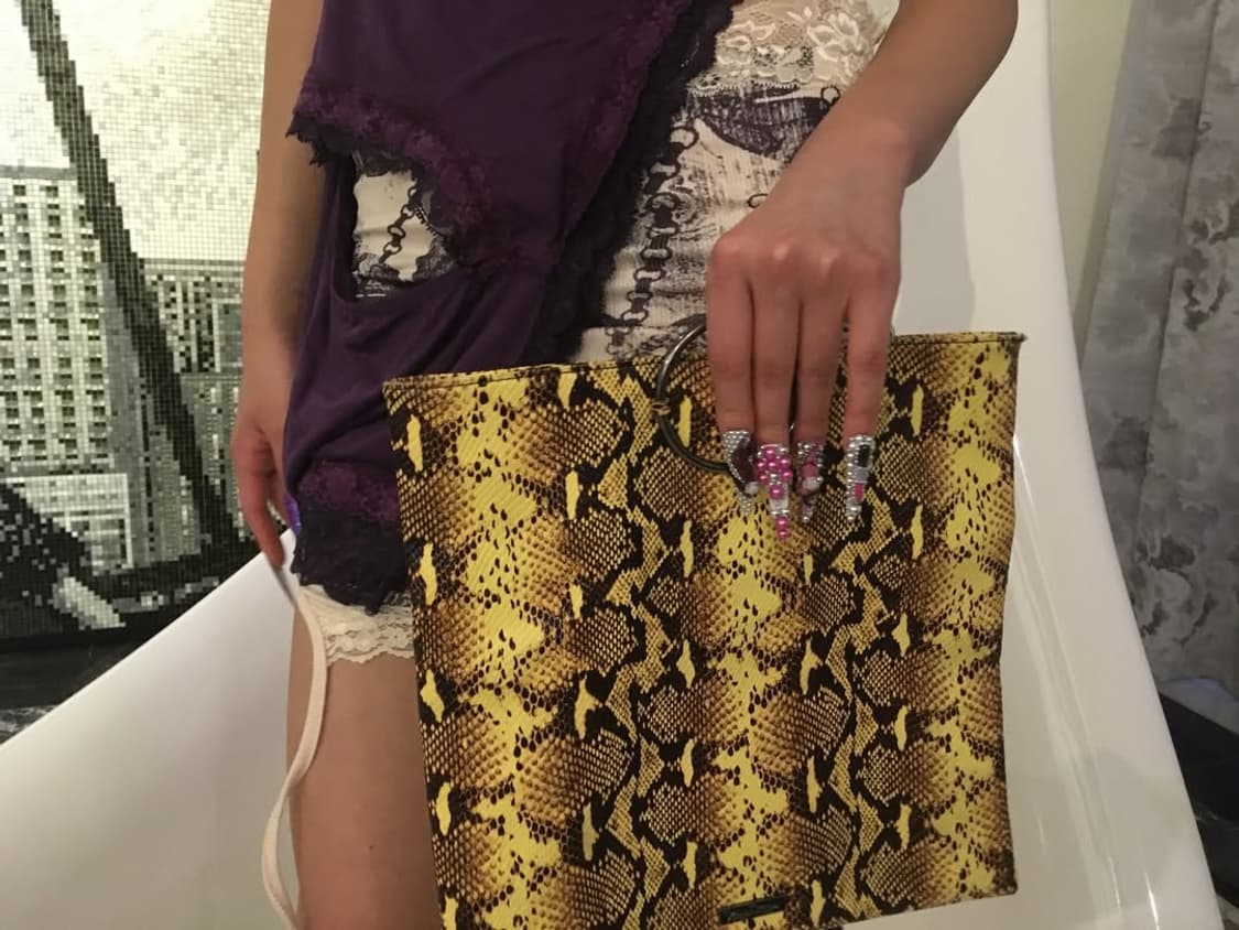 Python yellow clutch bag 상품이미지1