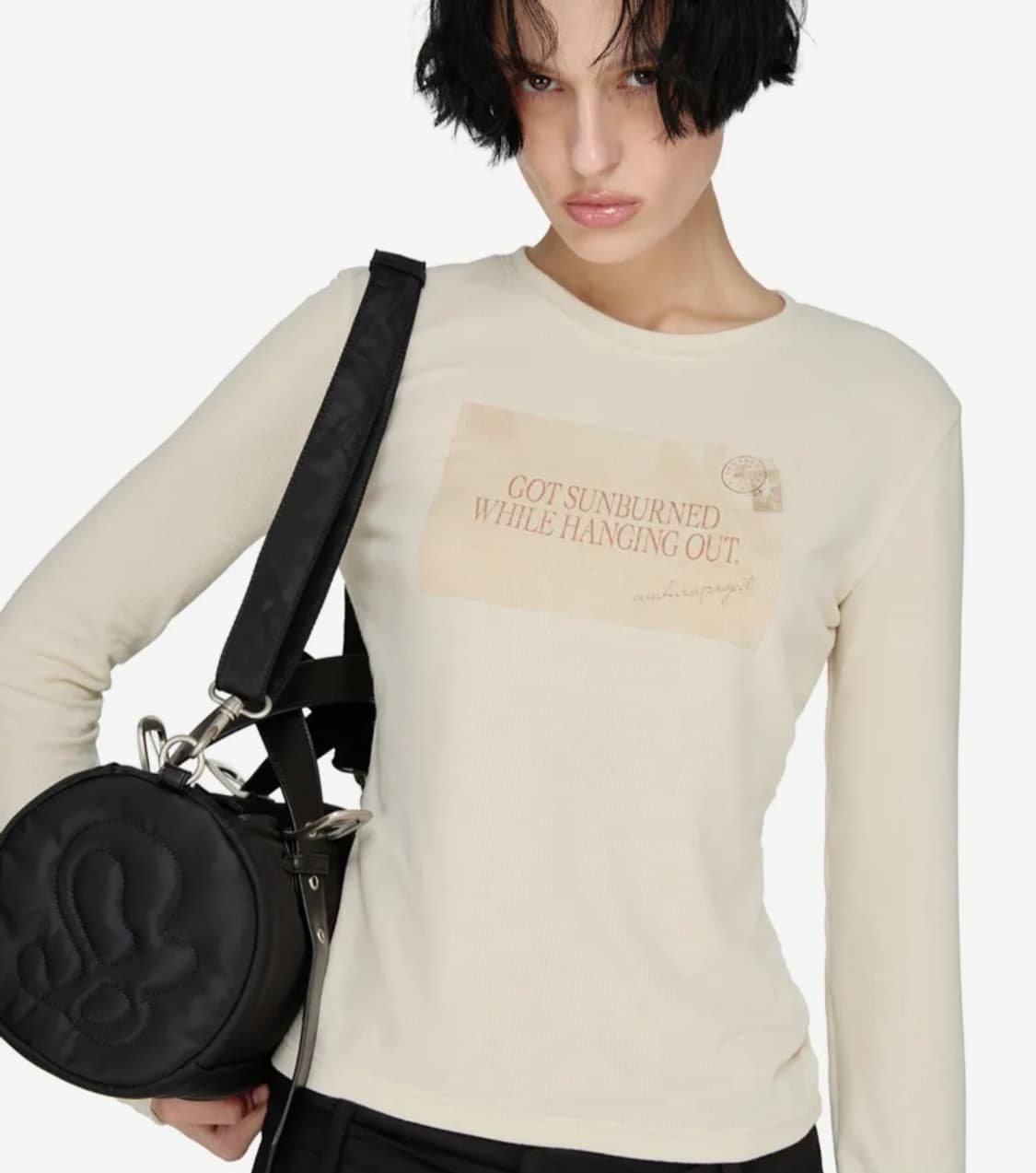 썬번프로젝트 패디드 심볼 트래블 백 블랙 상품이미지1