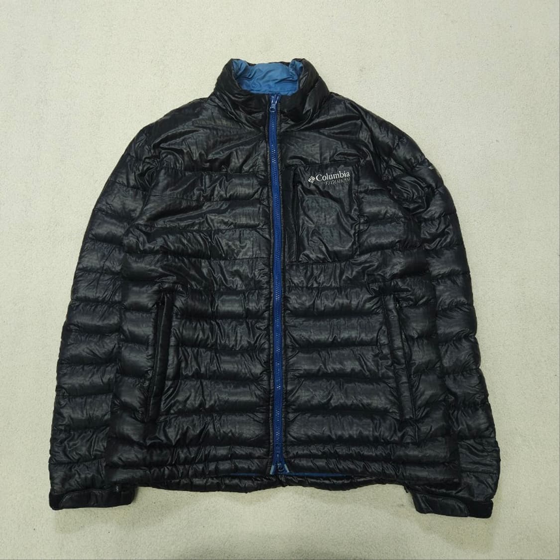 컬럼비아 티타늄 라이트 다운 곱창 패딩 L 블랙 상품이미지1