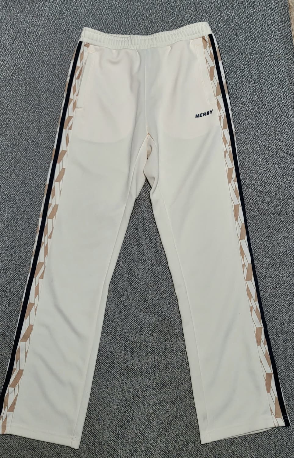 널디 Symbol 패턴 트랙 팬츠 크림 M 상품이미지1