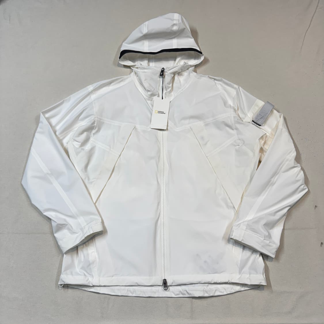 XL) 내셔널지오그래픽 화이트 바람막이 후드 자켓 미사용품 상품이미지1