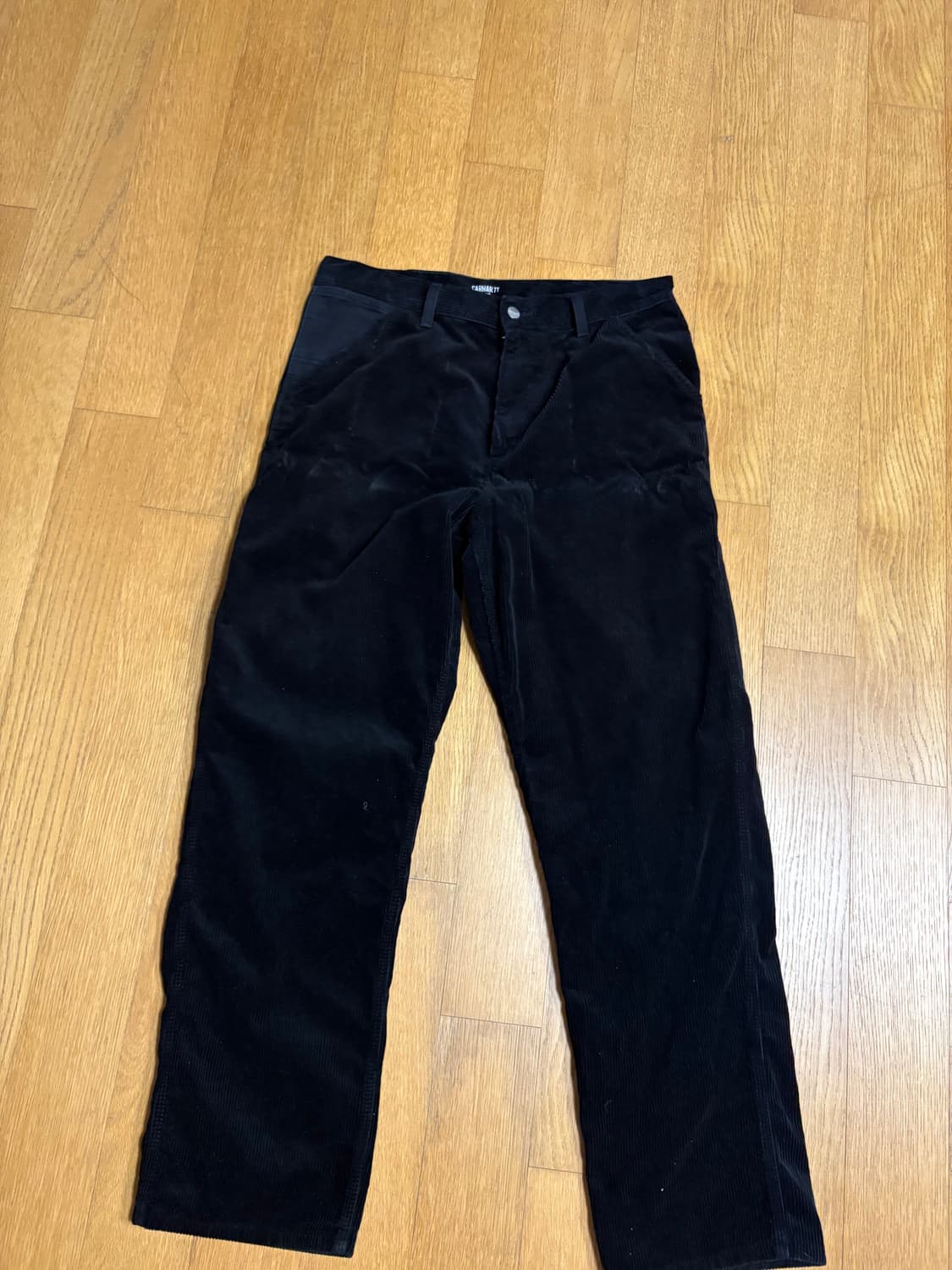 칼하트윕wip 블랙 코듀로이팬츠 싱글니 34 상품이미지1