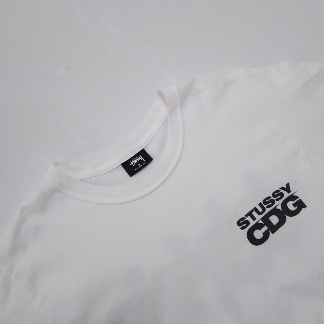 스투시x꼼데가르송 서프맨 반팔티 상품이미지3