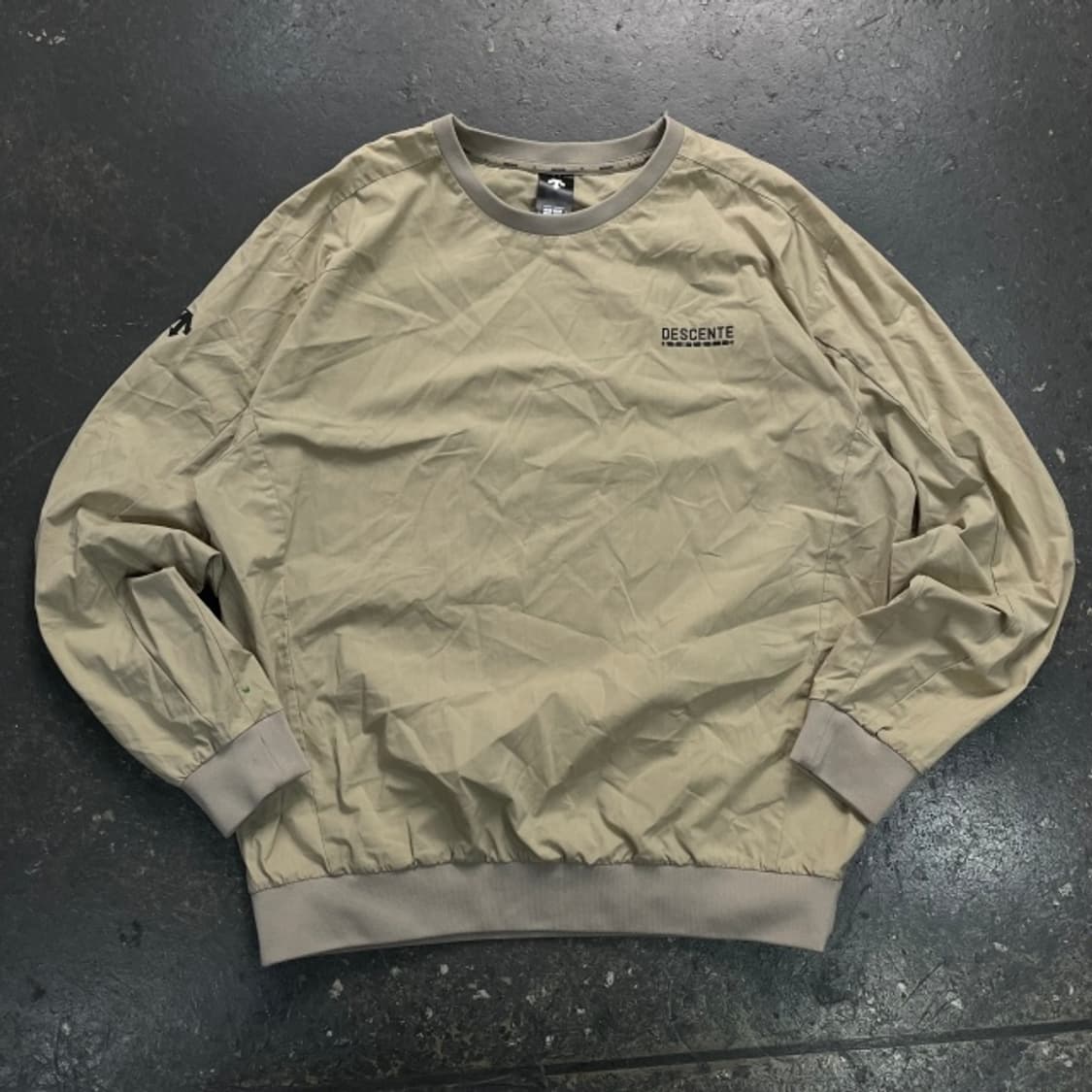 100 데상트 웜업 상품이미지1