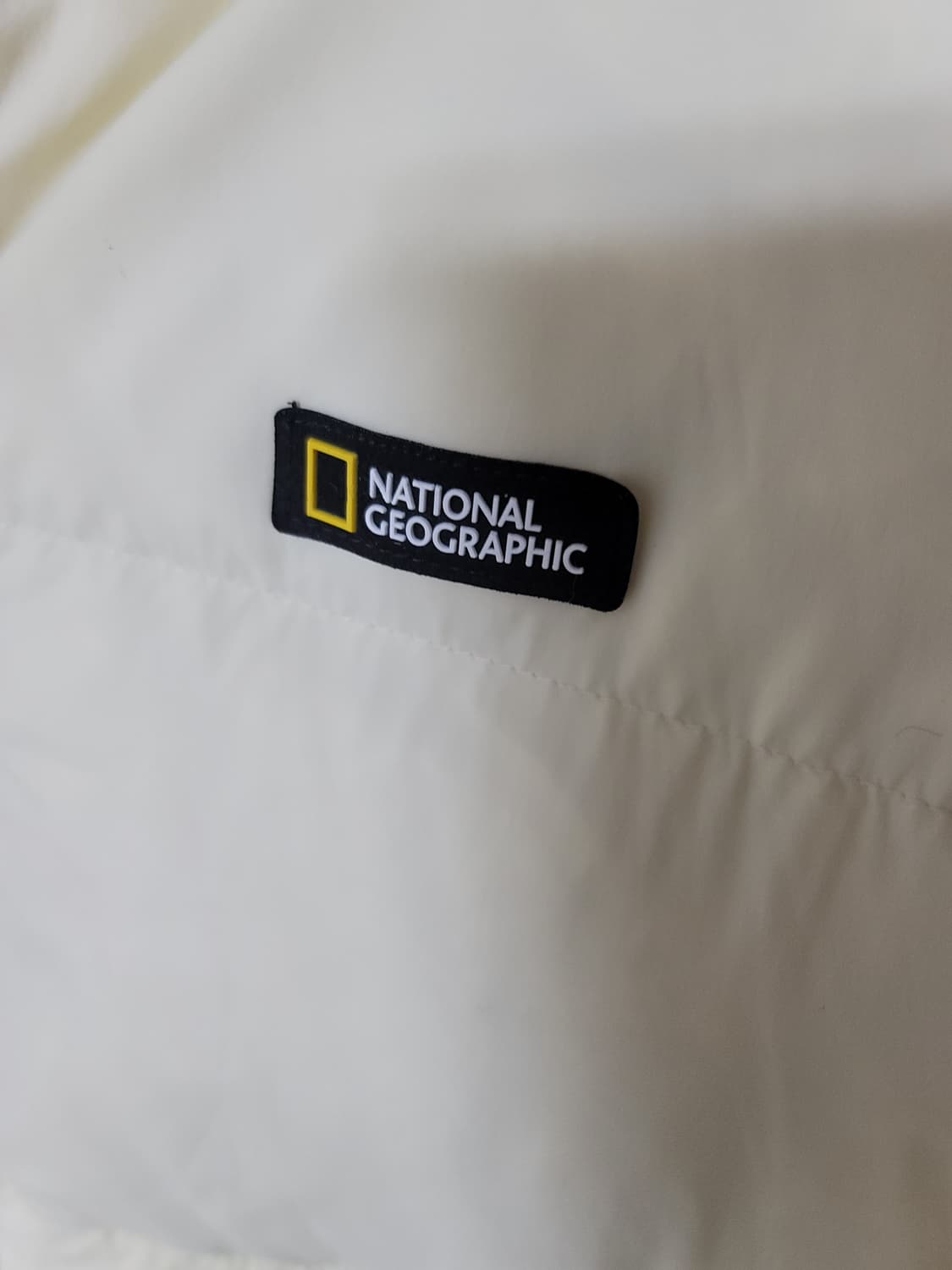 내셔널지오그래픽 구스다운패딩 아이보리 95사이즈 상태굿 상품이미지4