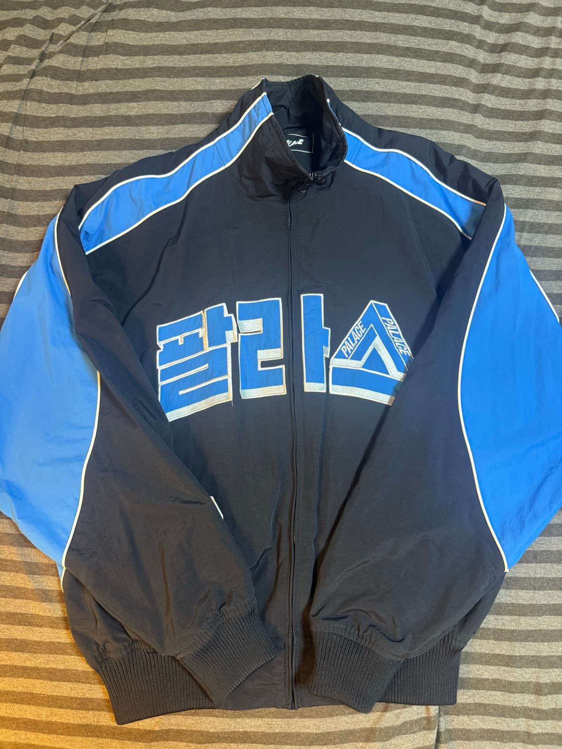 팔라스 서울 2 서울 트랙 자켓 블랙 블루 - 25SS 상품이미지1