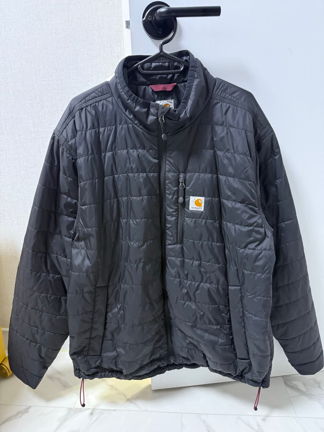 칼하트 경량패딩 블랙 L사이즈 상품이미지1