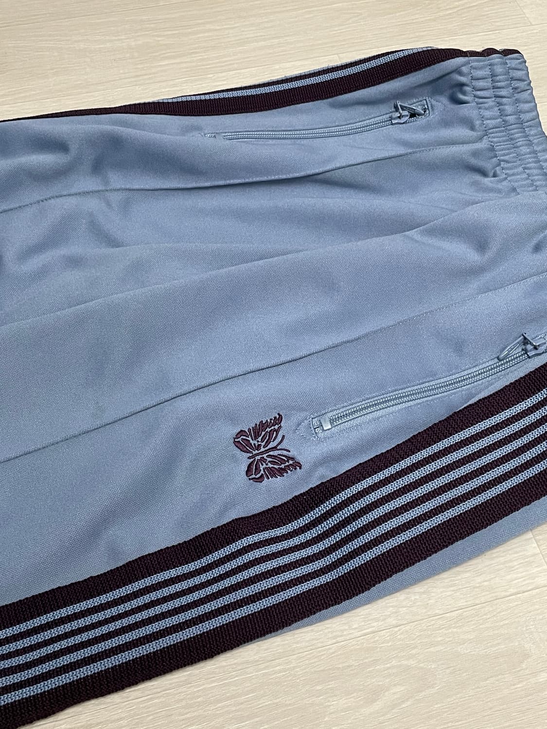 니들스 트랙팬츠 삭스블루 s 상품이미지1