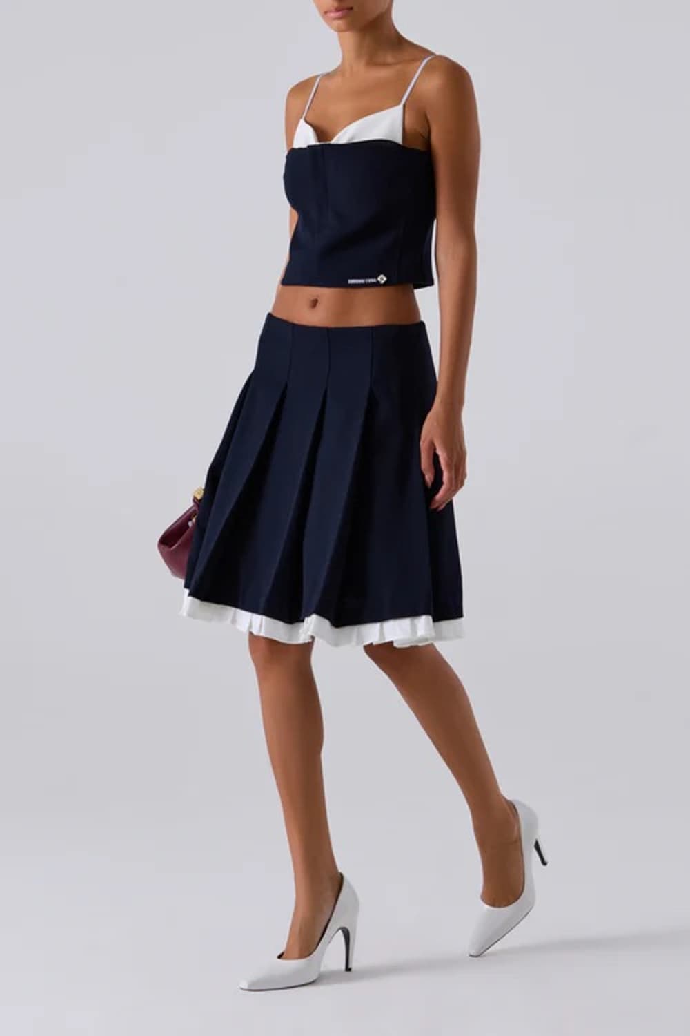 [6]슈슈통 25fw 더블 보우 레이어드 슬리브리스 탑/네이비 상품이미지4