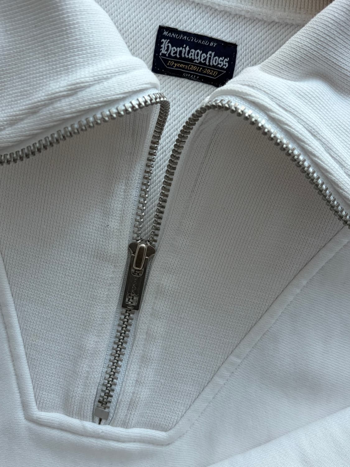 헤리티지플로스 하프집업 상품이미지1