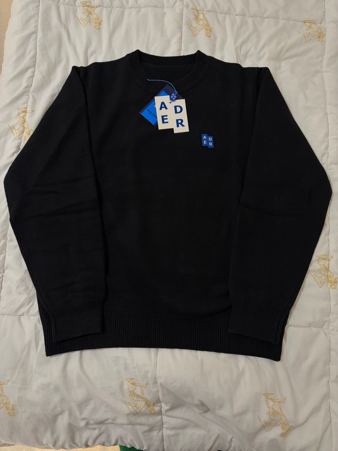 아더에러 니트 상품이미지1