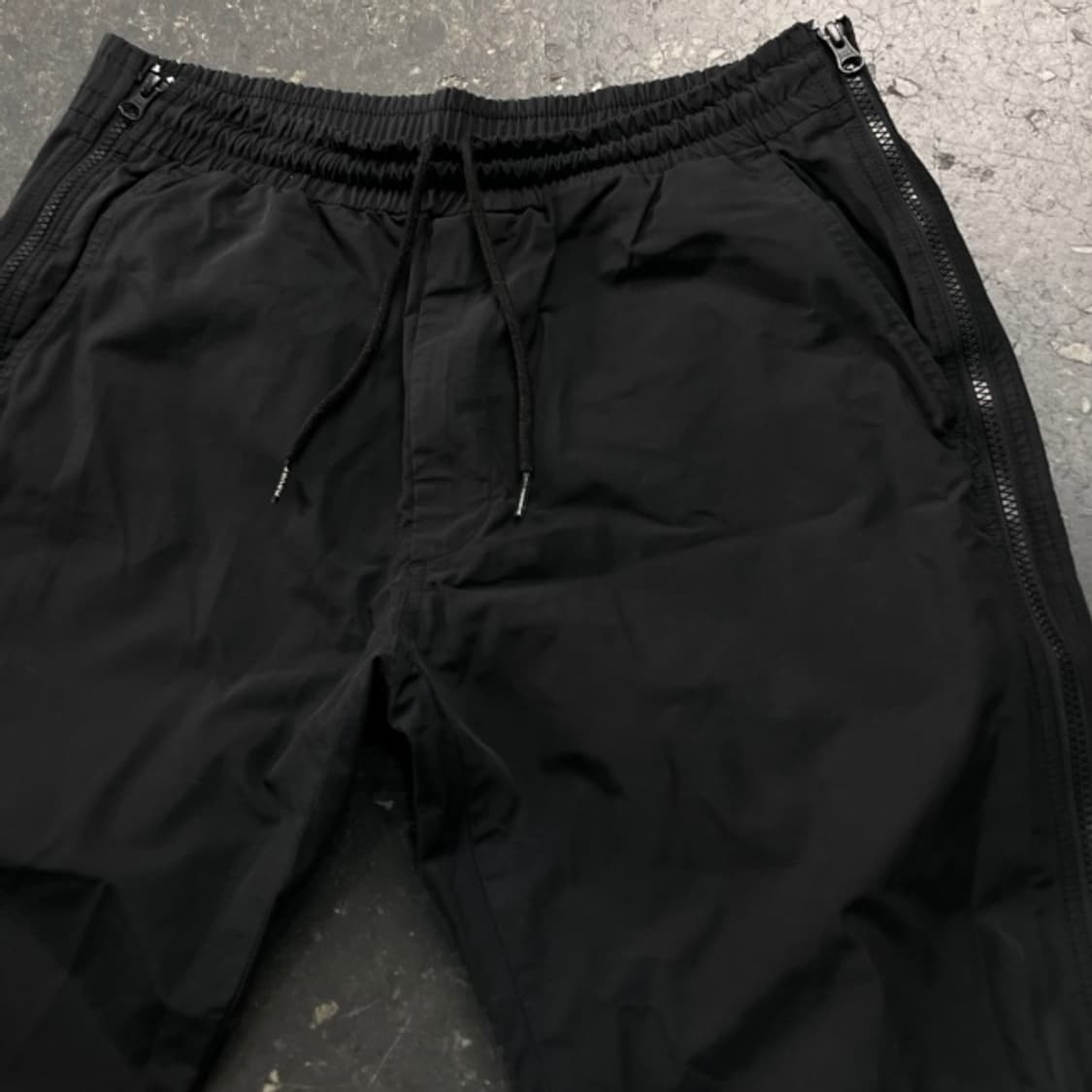 100 디스이즈네버댓 사이드 집업 나일론 팬츠 상품이미지2