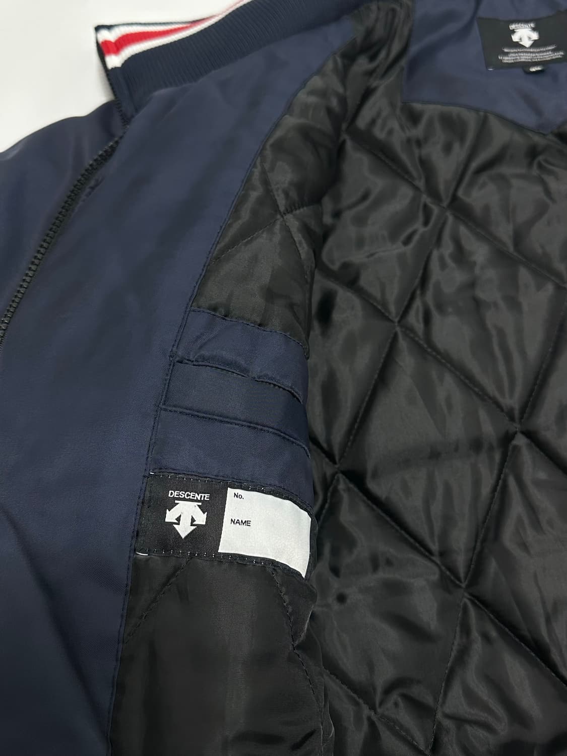 데상트 동계 야구점퍼 안감 누빔 상품이미지8