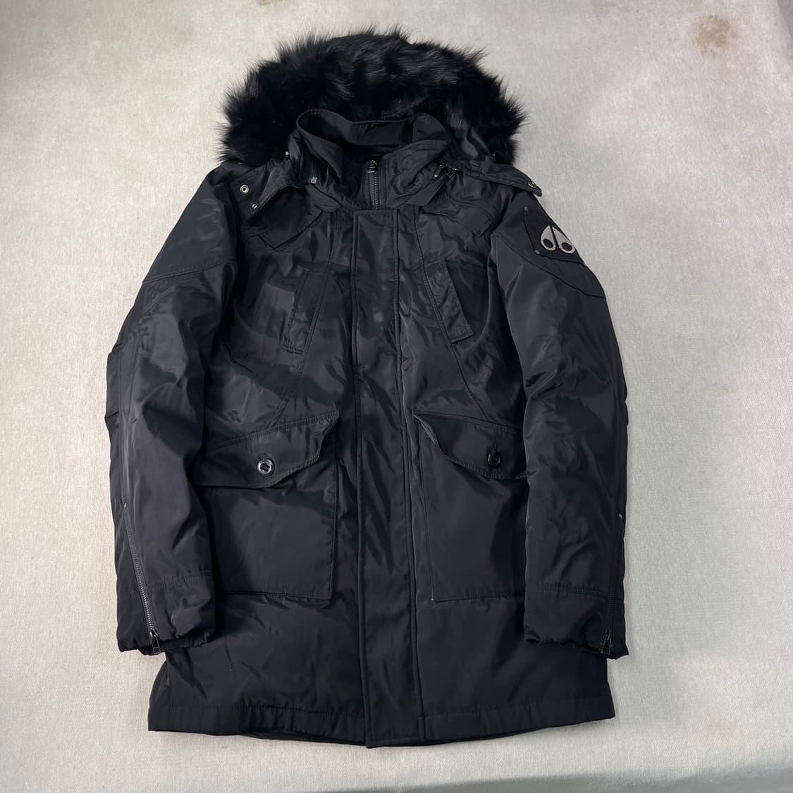 100 무스너클 스틸링 블랙 폭스퍼 구스다운 롱패딩 상품이미지1