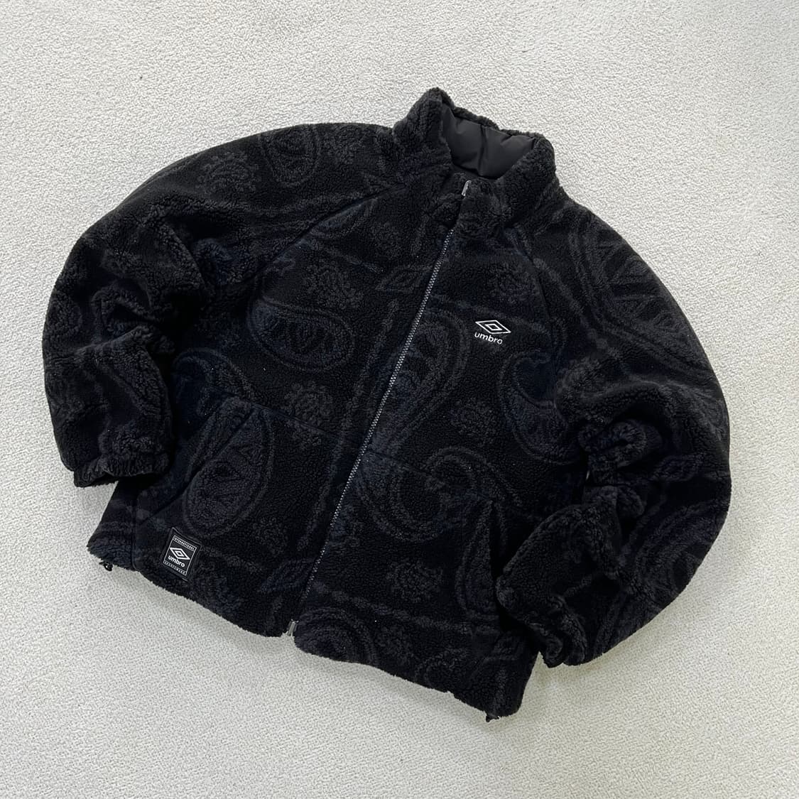 85 엄브로 리버시플 플리스 패딩 0325M 상품이미지1