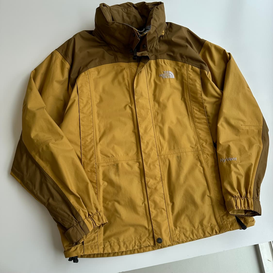 노스페이스00‘s머스타드브라운 하이벤트히든후드 윈드자 상품이미지1