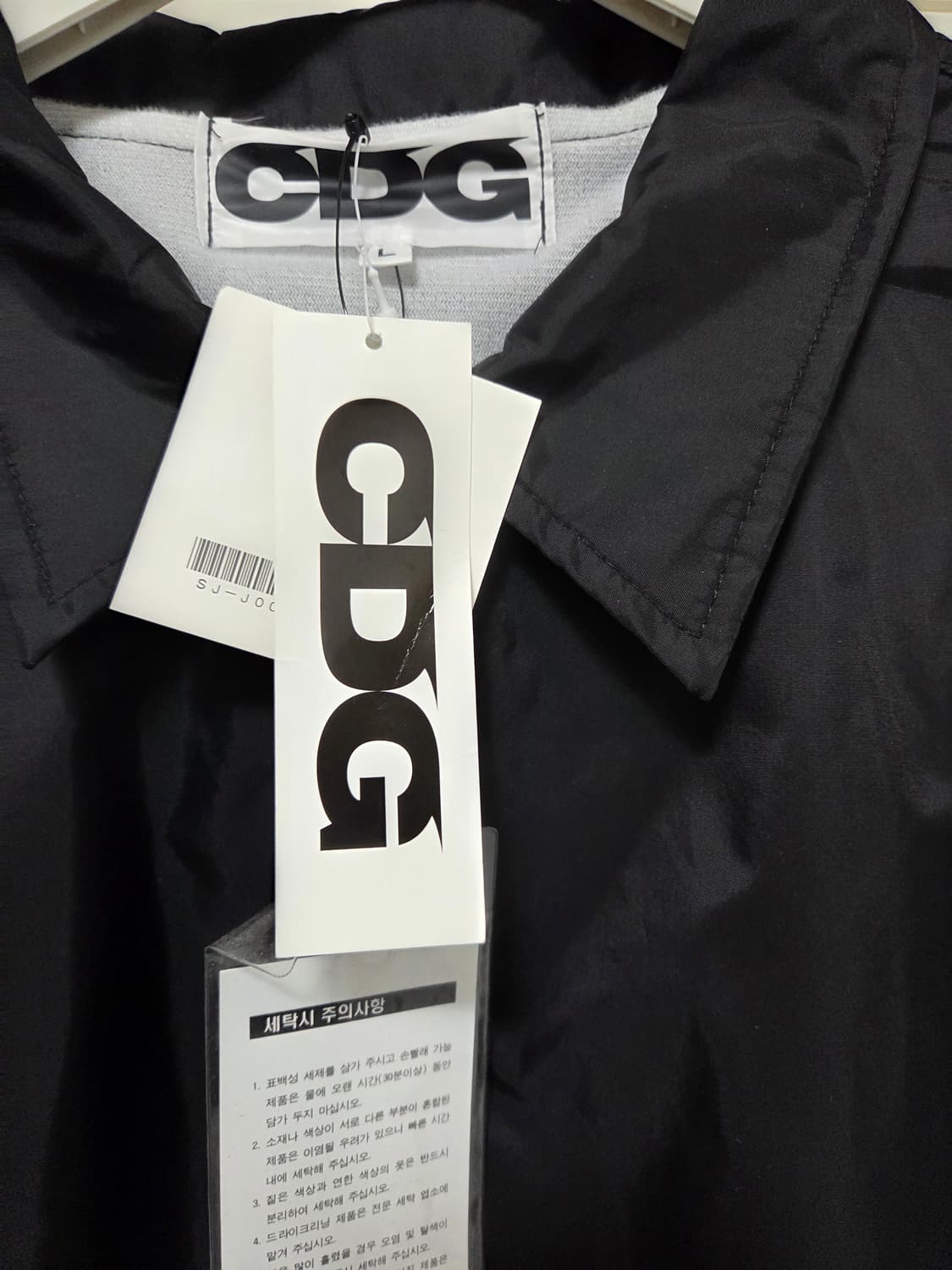 [새상품] cdg x 포켓몬 콜라보 코치자켓 상품이미지4