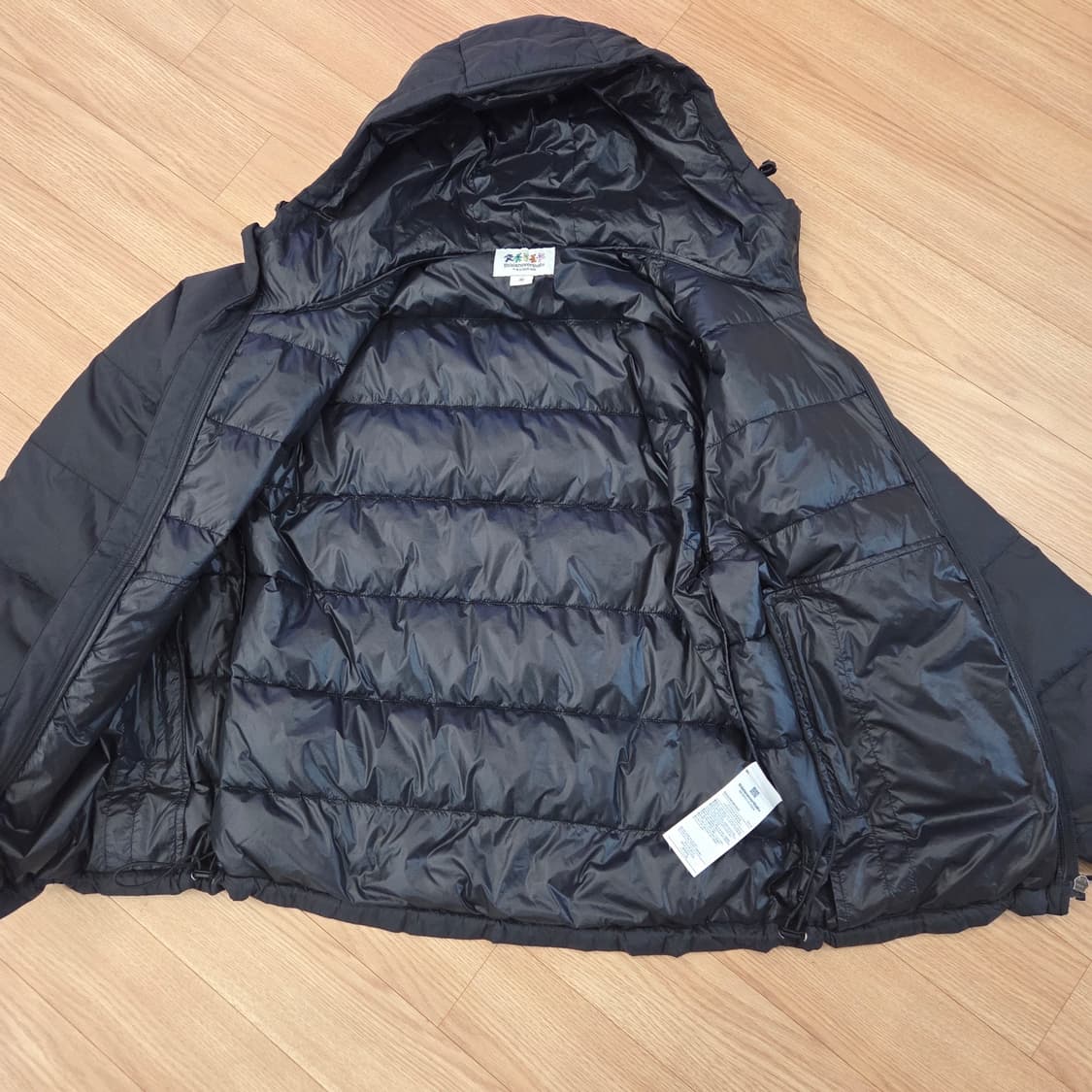 25년8월산 디스이즈네버댓 GD Light Down 패딩 블랙 M 상품이미지5