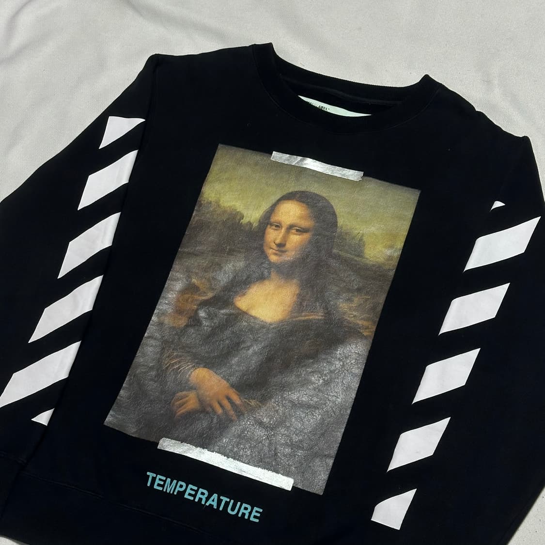 S 오프화이트 모나리자 프린팅 애로우 맨투맨 상품이미지1