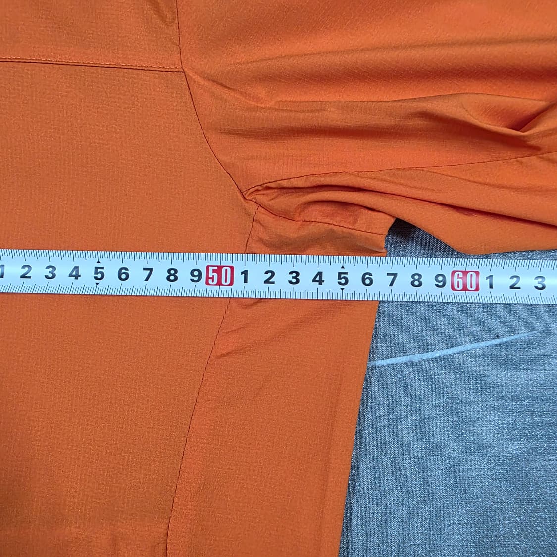 L 100 유니클로 경량 바람막이 오렌지 상품이미지6