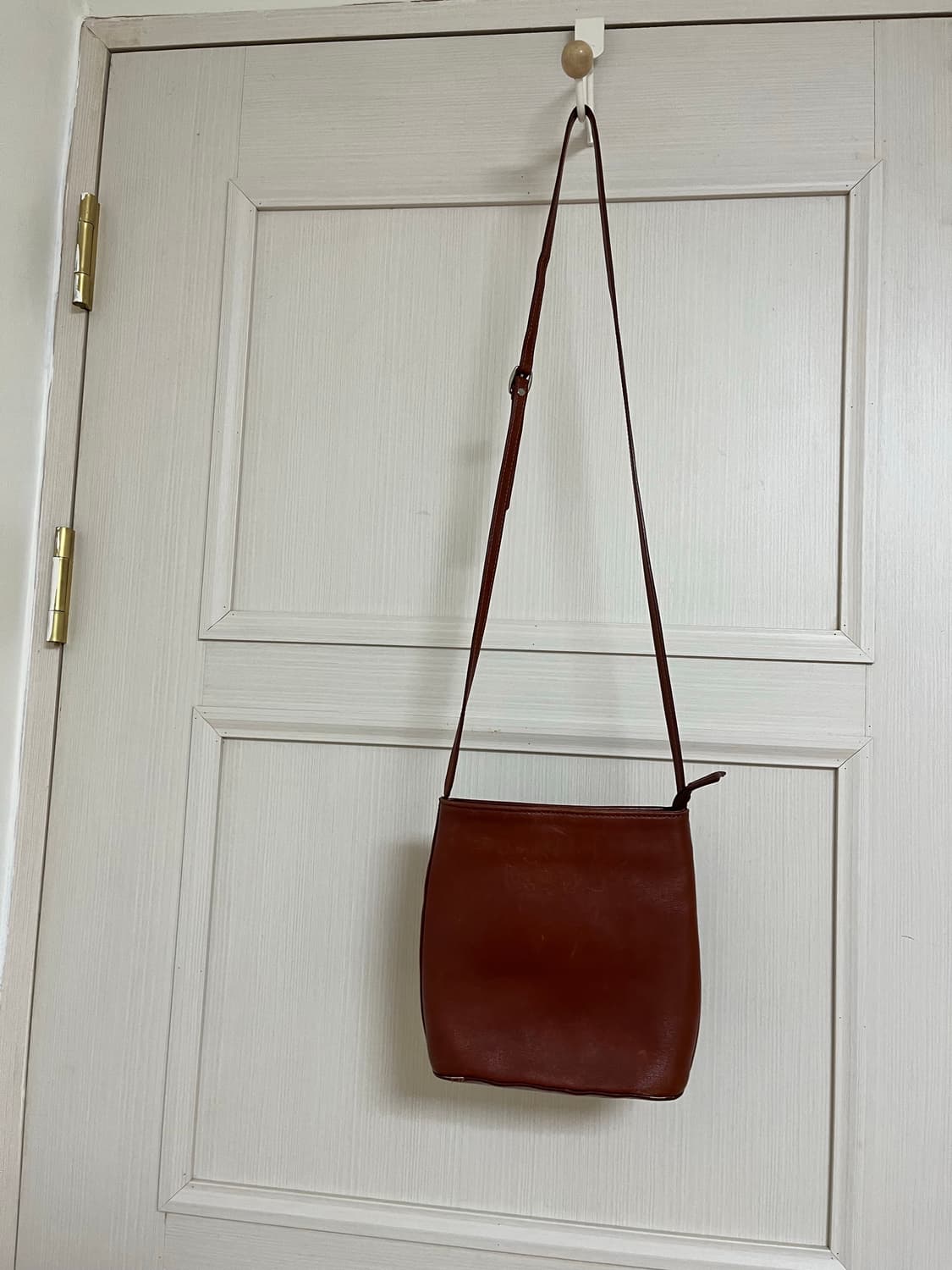 스키니피그 브라운 소가죽 리얼레더 크로스백 상품이미지1