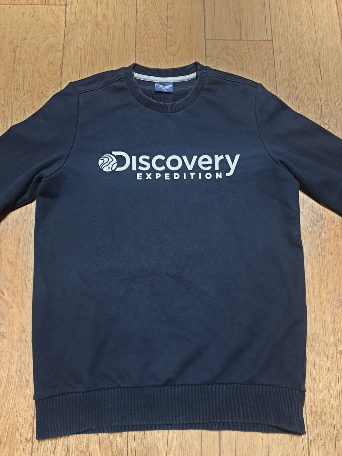 1222 디스커버리 맨투맨티 95 사이즈입니다 상품이미지1