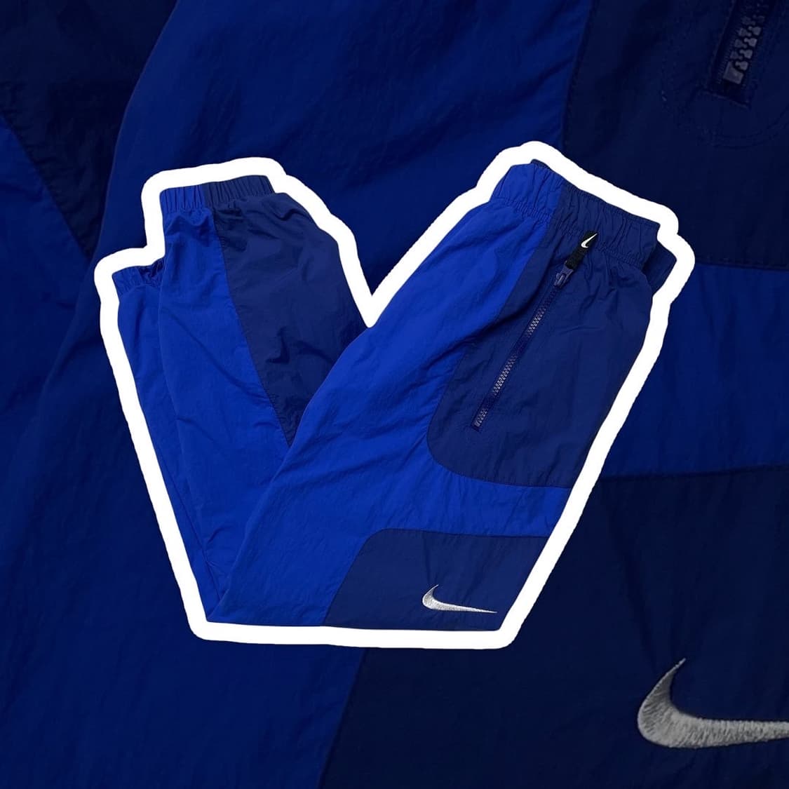 나이키 리이슈 우븐팬츠 상품이미지1