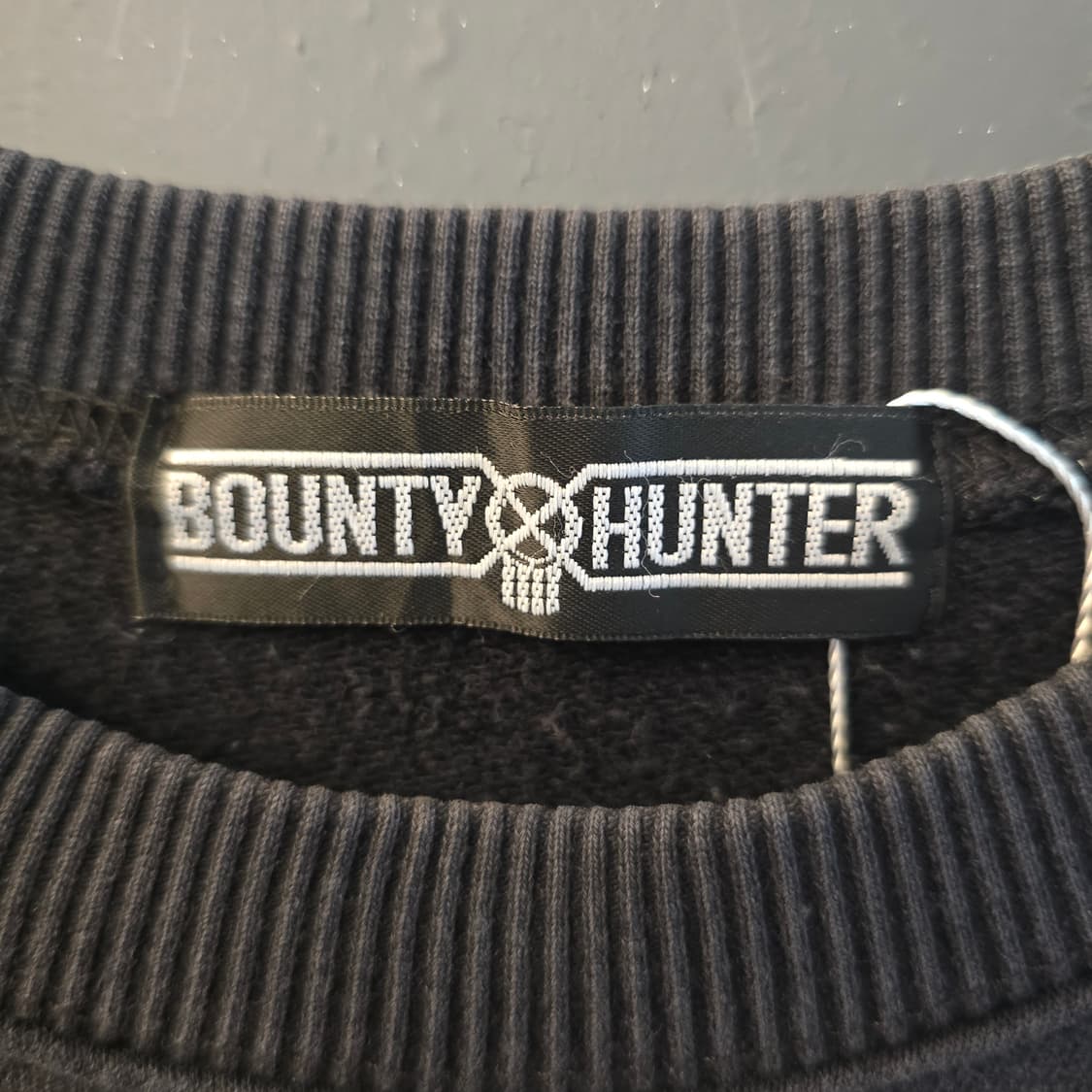 바운티헌터 스컬 프린팅 맨투맨 블랙 L 오버핏 상품이미지5