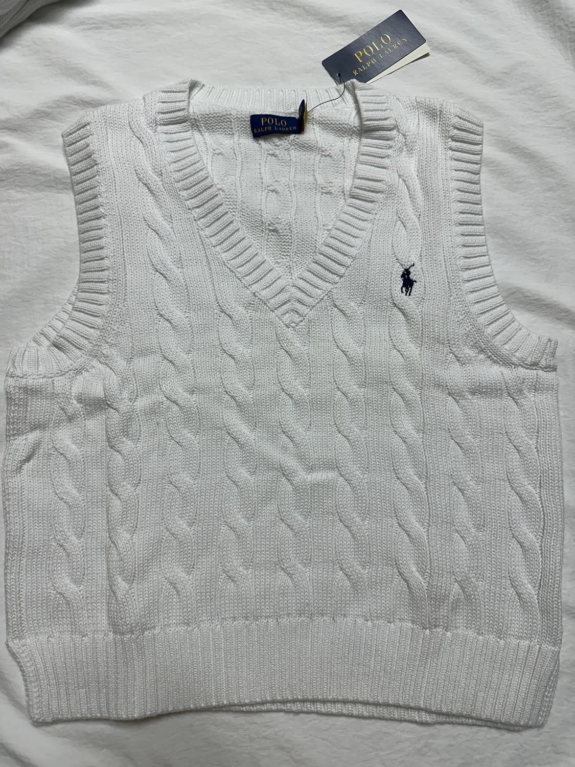폴로 랄프로렌 우먼 케이블 니트 코튼 슬리브리스 스웨터 차정원 착용 상품이미지6