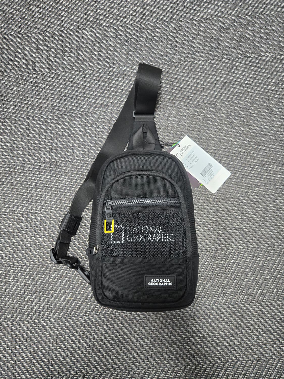 내셔널지오그래픽 블랙 슬링백 상품이미지1