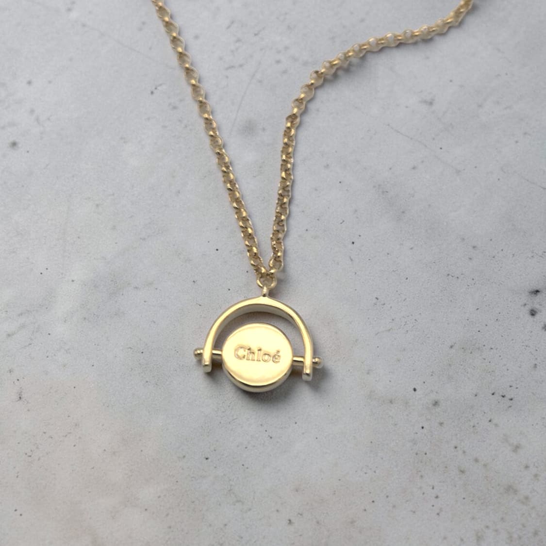 끌로에 회전 코인 목걸이
 상품이미지1