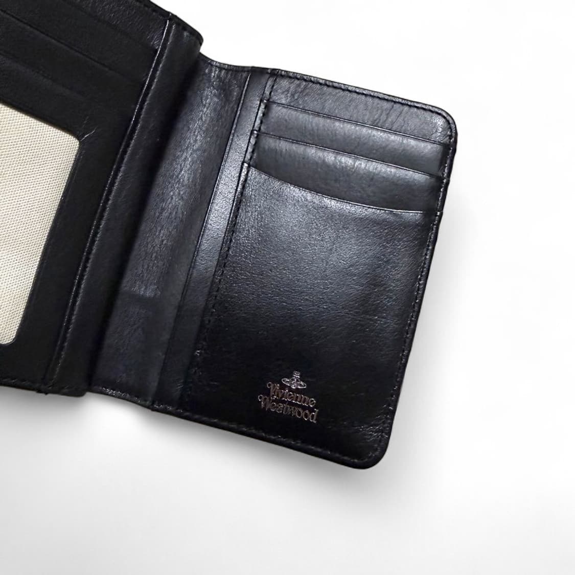 비비안 웨스트우드 오브로고 패턴 캔버스 트라이볼 지갑 상품이미지3