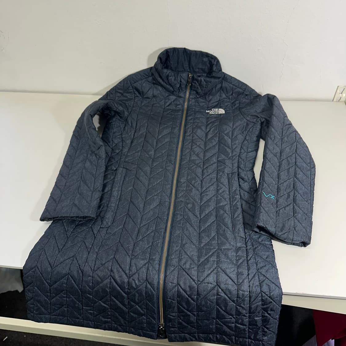 우먼M 노스페이스 네이비 경량패딩 상품이미지1