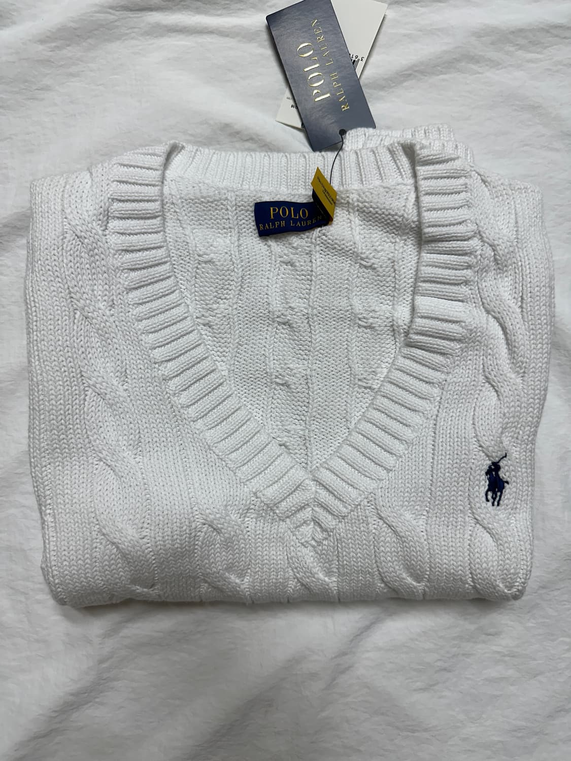 폴로 랄프로렌 우먼 케이블 니트 코튼 슬리브리스 스웨터 차정원 착용 상품이미지5