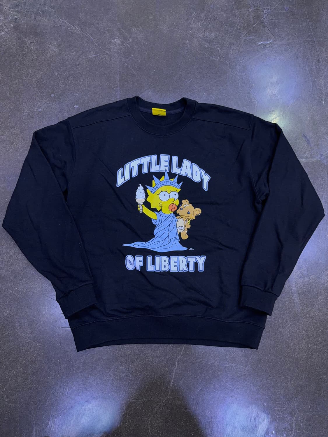 아크메드라비 x 심슨 가족 매기 오브 리버티 맨투맨 블랙 1 상품이미지1